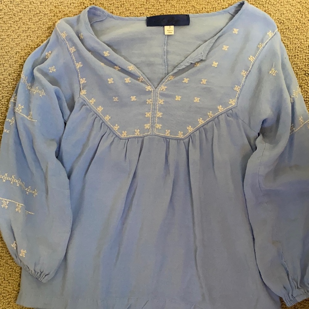 Super cute ladies size small shirt.